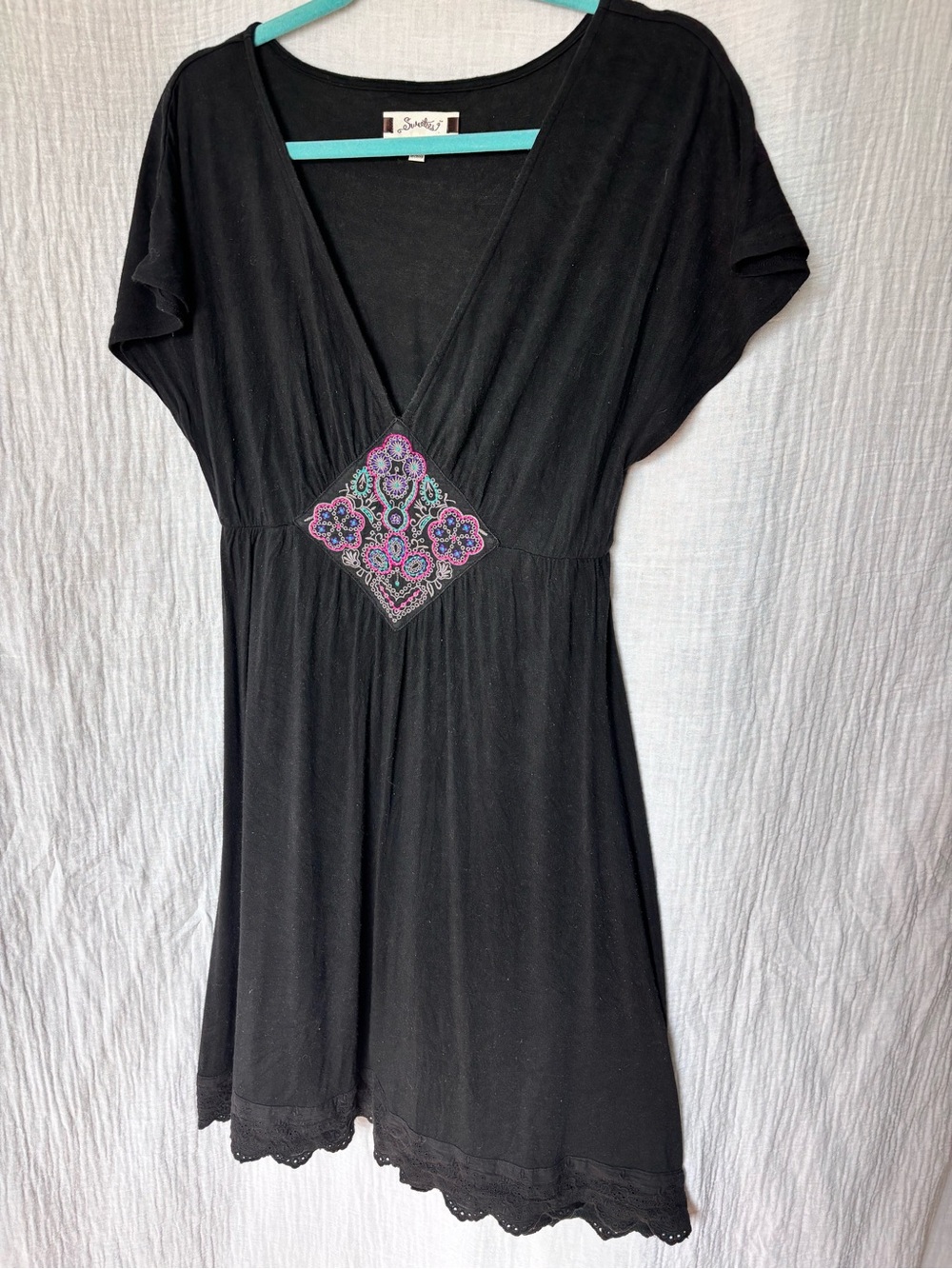 Sweetees Black Midi Dress with Teal Embroidered Accent and Eyelet Hem.